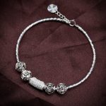 vòng tay bạc phối charm Kim Tiền với charm bi cắt giác và charm ống đính đá