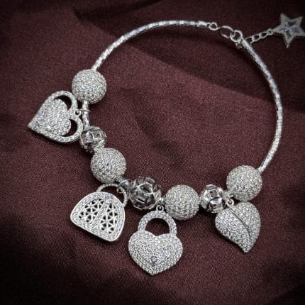 vòng tay bạc phối charm Trái Tim với charm tim charm túi và hạt bi sáng