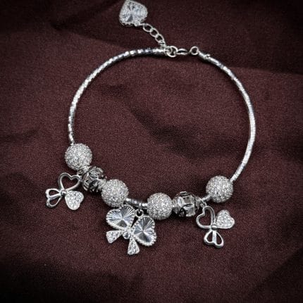 vòng tay bạc phối charm Nơ Bướm với hạt bi sáng và charm nữ tính