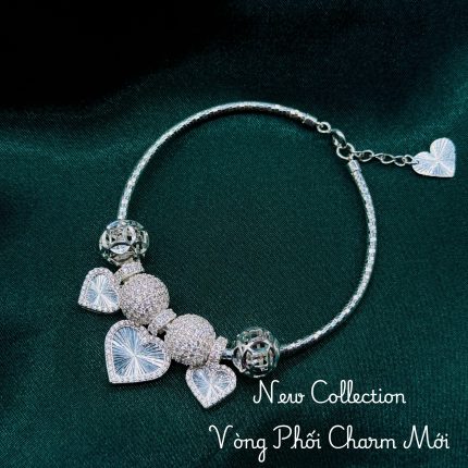 vòng tay nữ phối charm trái tim đính đá