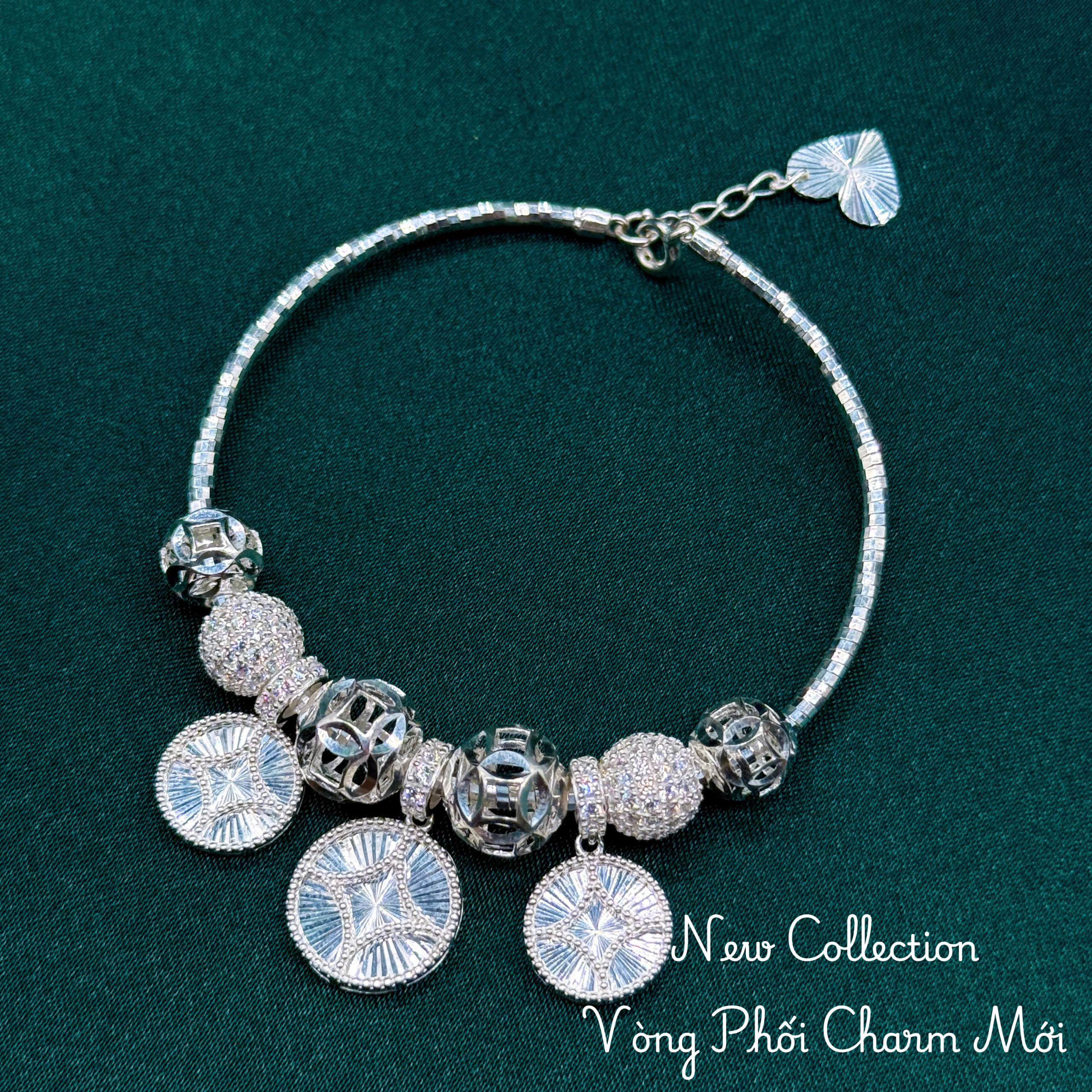 vòng tay nữ phối 3 charm mặt tròn