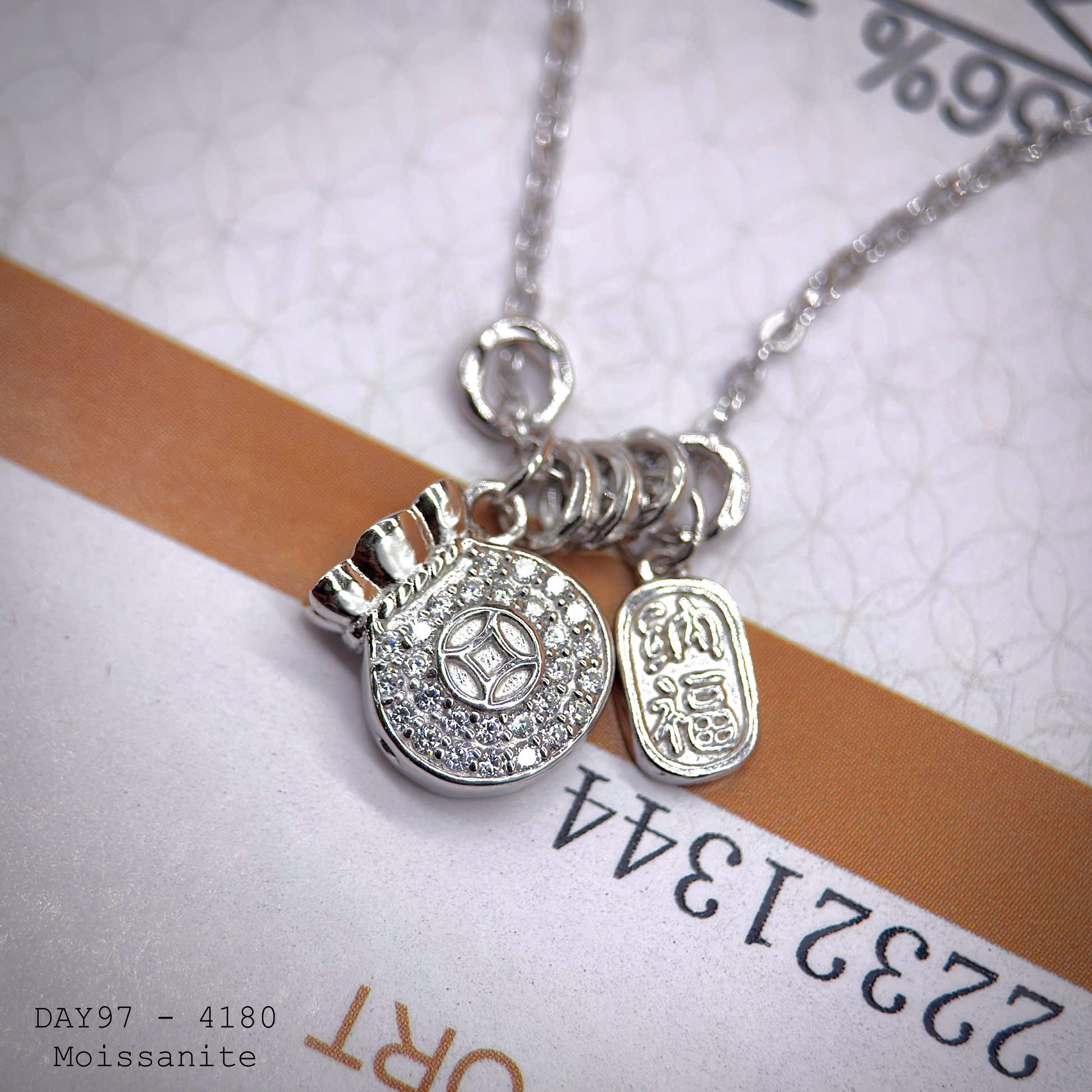 dây chuyền bạc túi tiền Moissanite